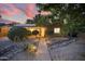 Charming home with front yard landscaping, walkway, and solar panels at 3018 E Mulberry Dr, Phoenix, AZ 85016