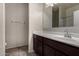 Bathroom featuring a vanity with storage and neutral walls, ideal for functionality and comfort at 30938 W Mitchell Dr, Buckeye, AZ 85396