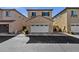 Charming home with a two-car garage, desert landscaping, and a well-maintained front exterior at 3131 S Mingus Dr, Chandler, AZ 85286