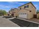 Charming home with a two-car garage, desert landscaping, and a well-maintained front exterior at 3131 S Mingus Dr, Chandler, AZ 85286