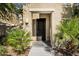 Close-up of the front door with desert landscaping and house number at 3131 S Mingus Dr, Chandler, AZ 85286