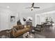 Open living room featuring a staircase and view of the dining and kitchen areas at 3131 S Mingus Dr, Chandler, AZ 85286