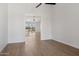 Open bedroom area featuring wood floors and stunning outdoor views at 31652 N Misty Ln, Queen Creek, AZ 85142