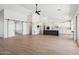 Spacious open-concept kitchen boasts a large island and white cabinetry, perfect for entertaining and Gathering gatherings at 31652 N Misty Ln, Queen Creek, AZ 85142