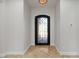 Welcoming entryway featuring neutral walls, tile floors, and a decorative wrought-iron door at 3215 E Constance Way, Phoenix, AZ 85042