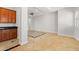 Spacious living room with decorative tile flooring and granite countertop wet bar area at 3215 E Constance Way, Phoenix, AZ 85042
