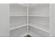 Large walk-in pantry closet with white walls and shelving at 3215 E Constance Way, Phoenix, AZ 85042