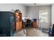 Functional home office with neutral paint and tile floors at 3911 W Quail Ave, Glendale, AZ 85308