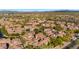 Stunning aerial view of a meticulously planned community with lush landscaping and tile roofs at 3935 E Rough Rider Rd # 1066, Phoenix, AZ 85050