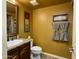 A cozy half-bathroom features an updated toilet, sink, and fixtures at 3935 E Rough Rider Rd # 1066, Phoenix, AZ 85050