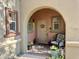 Cozy entryway with a welcoming door, decorative wreaths, and charming potted plants at 3935 E Rough Rider Rd # 1066, Phoenix, AZ 85050