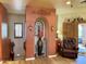 The entryway features decorative wrought ironwork, wall sconces, and a rustic archway at 3935 E Rough Rider Rd # 1066, Phoenix, AZ 85050