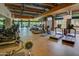 Fitness center with modern equipment and floor to ceiling windows overlooking beautifully landscaped grounds at 3935 E Rough Rider Rd # 1066, Phoenix, AZ 85050