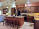 Modern kitchen with stainless steel appliances and eat-in island at 3935 E Rough Rider Rd # 1066, Phoenix, AZ 85050