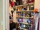 Walk-in pantry stocked with food, drinks, and household goods at 3935 E Rough Rider Rd # 1066, Phoenix, AZ 85050