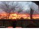 Picturesque sunset view from the outdoor patio, complete with seating and vibrant sky colors at 3935 E Rough Rider Rd # 1066, Phoenix, AZ 85050