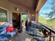 Inviting patio features comfortable seating, glass table, and tranquil views of the surrounding landscape at 3935 E Rough Rider Rd # 1066, Phoenix, AZ 85050