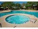 Tranquil pool and spa surrounded by lush greenery provide residents with a resort-like experience at 3935 E Rough Rider Rd # 1066, Phoenix, AZ 85050