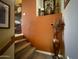 Staircase with carpet steps leads to another level of the home at 3935 E Rough Rider Rd # 1066, Phoenix, AZ 85050