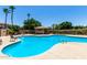 Inviting community pool with comfortable lounge chairs for relaxation at 4072 E Windsor Dr, Gilbert, AZ 85296