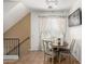 Dining area with a round table, chairs, neutral walls, and natural light at 4072 E Windsor Dr, Gilbert, AZ 85296