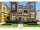 Charming multi-story townhome with stone accents, neat landscaping, and a welcoming front entrance at 4072 E Windsor Dr, Gilbert, AZ 85296