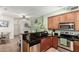 Modern kitchen with stainless steel appliances and an open design to the living room at 4072 E Windsor Dr, Gilbert, AZ 85296