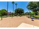 Outdoor playground featuring swings and slides, ideal for families at 4072 E Windsor Dr, Gilbert, AZ 85296