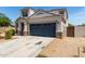 Lovely two-story house with an attached two-car garage and low maintenance landscaping at 42098 W Balsa Dr, Maricopa, AZ 85138