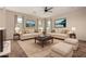 Well-decorated living room with two sofas, a coffee table, and neutral color palette at 42098 W Balsa Dr, Maricopa, AZ 85138