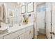 Beautiful bathroom features dual sinks, white cabinets, and a shower-tub combo at 4215 E Ronald St, Gilbert, AZ 85295