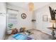 Zen bedroom with yoga mat and meditation space with chandelier lighting at 4215 E Ronald St, Gilbert, AZ 85295