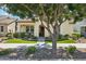 Inviting single-story home featuring a welcoming porch and neat landscaping, enhancing its curb appeal at 4215 E Ronald St, Gilbert, AZ 85295