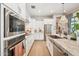 Bright kitchen featuring modern appliances, granite countertops, and ample storage, perfect for cooking at 4215 E Ronald St, Gilbert, AZ 85295