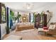 Cozy living room with eclectic decor, plush seating, and natural light, creating a relaxing and inviting atmosphere at 4215 E Ronald St, Gilbert, AZ 85295