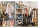 Organized walk-in closet with ample shelving and hanging space for clothing and accessories at 4215 E Ronald St, Gilbert, AZ 85295