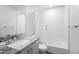 Clean bathroom featuring a granite countertop and tiled shower at 4312 E Roma Ave, Phoenix, AZ 85018