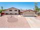 Charming two-story home with a well-manicured yard, fountain, and an attached two-car garage at 4414 S Ventura Dr, Tempe, AZ 85282