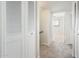 This hallway features neutral carpeting and a closet for storage at 4414 S Ventura Dr, Tempe, AZ 85282