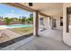 Inviting back patio with view of pool and backyard at 4684 W Tyson St, Chandler, AZ 85226