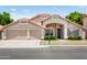 Inviting single-story home showcasing a desert landscape, a two-car garage and beautiful architectural details at 4684 W Tyson St, Chandler, AZ 85226