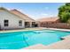 Sparkling blue pool, perfect for hot summer days with covered patio nearby at 4684 W Tyson St, Chandler, AZ 85226