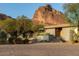 Stunning single-story home featuring desert landscaping with mountain views in the background at 5331 E Mcdonald Dr, Paradise Valley, AZ 85253