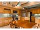 Bright and spacious kitchen with wooden cabinets, stainless steel appliances and tile floors at 5331 E Mcdonald Dr, Paradise Valley, AZ 85253