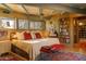 Inviting main bedroom with a comfortable bed, eclectic decor, and great natural light at 5331 E Mcdonald Dr, Paradise Valley, AZ 85253
