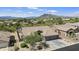 Aerial view of a single-Gathering home in a desert community with mountain backdrop at 5332 E Thunder Hawk Rd, Cave Creek, AZ 85331