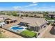 Beautiful backyard featuring a pool, putting green, pergola, and covered patio at 5332 E Thunder Hawk Rd, Cave Creek, AZ 85331