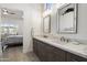 Chic bathroom with and vanity sinks, and a view into the Primary bedroom at 5332 E Thunder Hawk Rd, Cave Creek, AZ 85331