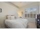 Well lit bedroom with white carpet, a large window, and a pristine aesthetic at 5332 E Thunder Hawk Rd, Cave Creek, AZ 85331