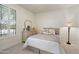 Relaxing bedroom with natural light from the window, carpet flooring, and a cozy aesthetic at 5332 E Thunder Hawk Rd, Cave Creek, AZ 85331